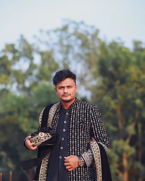 Man in an embroidered jodhpuri-style outfit