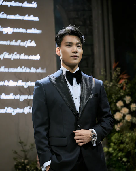 Man in a black tuxedo with bow tie