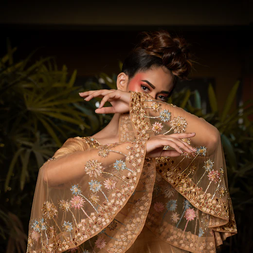 Woman in an ornate golden gown